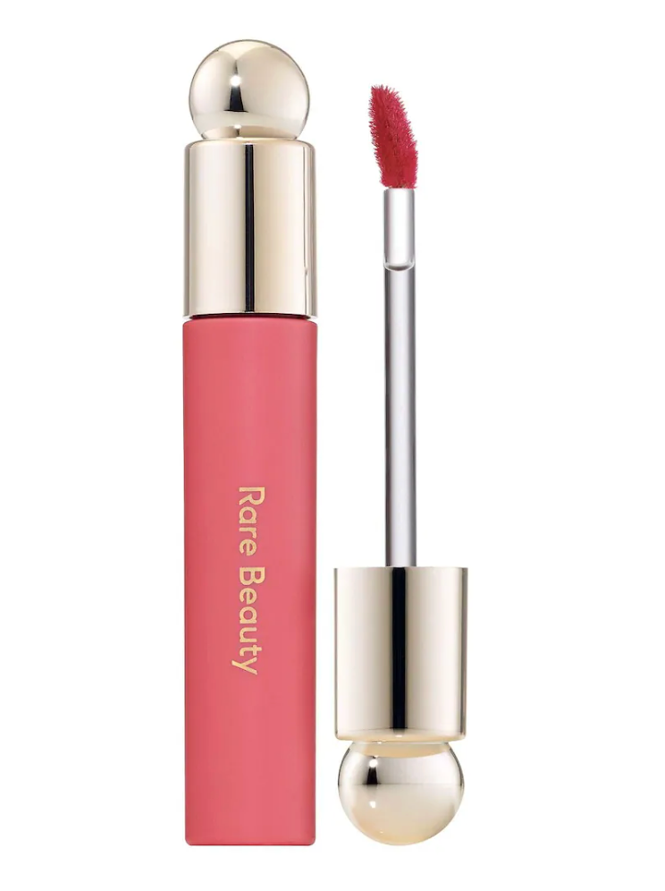 Aceite labial con color Soft Pinch de Rare Beauty, hidrata con aceite de jojoba, 100% original. Envío nacional garantizado desde Miracle Store Colombia.